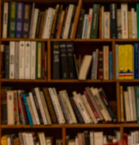 Wooden,Shelf,With,Books,In,A,Row.,Education,And,Knowledge. Wooden shelf with books in a row. Education and knowledge. Blurred.